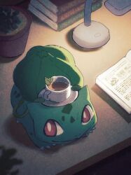 Rule 34 | arc draws, book, bright pupils, bulbasaur, claws, commentary request, creatures (company), cup, desk, desk lamp, from above, game freak, gen 1 pokemon, highres, indoors, lamp, mint, nintendo, no humans, plant, pokemon, pokemon (creature), red eyes, saucer, solo, teacup, vines, white pupils