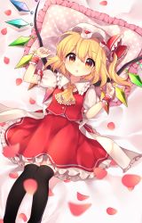 Rule 34 | 1girl, :o, absurdres, ascot, bed sheet, black thighhighs, blonde hair, blush, breasts, buttons, clenched hands, commentary request, crystal, flandre scarlet, frilled ascot, frilled cuffs, frilled ribbon, frilled shirt collar, frilled skirt, frills, from above, hair between eyes, hat, hat ribbon, highres, looking at viewer, lying, mob cap, multicolored wings, on back, on bed, one side up, open mouth, orange eyes, petals, pillow, polka dot, polka dot pillow, puffy short sleeves, puffy sleeves, red ribbon, red skirt, red vest, ribbon, ruhika, shirt, short hair, short sleeves, skirt, skirt set, small breasts, solo, thighhighs, touhou, vest, white hat, white shirt, wings, wrist cuffs, yellow ascot, zettai ryouiki