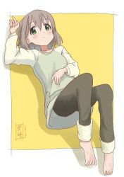 Rule 34 | 1girl, 2019, barefoot, black pants, blush, dated, green eyes, grey hair, hand on own stomach, highres, kohshibasaki, long shirt, looking at viewer, lying on ground, multicolored shirt, no shoes, pants, short hair, signature, solo, yama no susume, yellow background, yukimura aoi