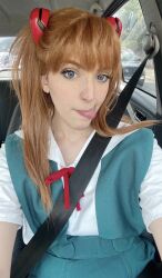Rule 34 | 1girl, :q, blue eyes, brazilian (nationality), breasts, brown hair, cosplay, hairpods, highres, interface headset, licking lips, lips, looking at viewer, medium breasts, memepantazis, neon genesis evangelion, photo (medium), real life, school uniform, seatbelt, sitting, skirt, souryuu asuka langley, souryuu asuka langley (cosplay), tokyo-3 middle school uniform, tongue, tongue out, twintails, two side up, vehicle interior