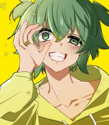 Rule 34 | 1girl, :d, assault lily, collarbone, commentary request, fangs, fingernails, green eyes, green hair, grin, hair between eyes, hand on own cheek, hand on own face, hand up, highres, hood, hood down, hoodie, jewelry, kikikaikai (kikikaikai chan), long sleeves, looking at viewer, open mouth, portrait, ring, short hair, simple background, smile, solo, sparkle, two side up, uneven eyes, wide-eyed, yellow background, yellow hoodie, yoshimura thi mai