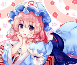 Rule 34 | 1girl, ass, blue hat, blue kimono, commentary request, floral background, hands on own face, hat, japanese clothes, kimono, long sleeves, looking at viewer, lying, mob cap, nagare, on stomach, open mouth, pink eyes, pink hair, saigyouji yuyuko, sash, solo, touhou, triangular headpiece
