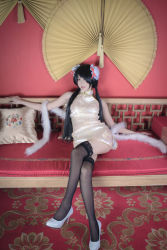 Rule 34 | 1girl, asian, bare shoulders, black hair, black thighhighs, bun cover, china dress, chinese clothes, color contacts, cosplay, crossed legs, date a live, double bun, dress, feather boa, hair bun, hair over one eye, high heels, indoors, lace, lace-trimmed legwear, lace trim, long hair, looking at viewer, makeup, mascara, parted lips, photo (medium), red eyes, shoes, short china dress, sitting, sleeveless, sleeveless dress, solo, thighhighs, tokisaki kurumi, tokisaki kurumi (cosplay), twintails, white footwear, zettai ryouiki