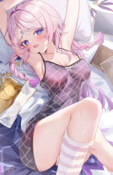 1girl armpits arms_up bare_legs bare_shoulders blue_eyes blush braid breasts chips_(food) citlali_(genshin_impact) dress facial_mark forehead_mark genshin_impact hair_ornament jura long_hair looking_at_viewer lying medium_breasts multicolored_hair open_mouth pillow pink_dress pink_hair pink_pupils potato_chips snack solo triangle triangle_facial_mark twin_braids