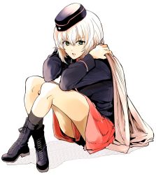 Rule 34 | 1girl, ankle boots, black footwear, black hat, black jacket, black socks, blue eyes, bonkara (sokuseki maou), boots, brown coat, coat, coat on shoulders, commentary, cross-laced footwear, full body, garrison cap, girls und panzer, hat, highres, insignia, itsumi erika, jacket, kuromorimine military uniform, lace-up boots, long sleeves, looking at viewer, medium hair, military, military hat, military uniform, miniskirt, open mouth, pleated skirt, red skirt, shadow, silver hair, simple background, sitting, skirt, socks, solo, uniform, white background