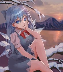 Rule 34 | 1girl, absurdres, alternate hair length, alternate hairstyle, blue bow, blue dress, blue eyes, blue hair, bow, bowtie, branch, breasts, cirno, dress, feet out of frame, hair behind ear, hair between eyes, hand on own cheek, hand on own face, hand up, highres, knee up, lake, light smile, long hair, looking at viewer, medium breasts, misty lake, mountainous horizon, parted lips, red bow, red bowtie, snow, solo, sunset, tomo 527, touhou, tree, twilight, very long hair, water, wing collar