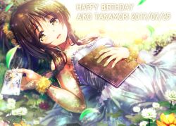 Rule 34 | 10s, 1girl, blush, book, brown eyes, brown hair, character name, dated, dress, field, flower, flower field, hair ornament, happy birthday, idolmaster, idolmaster cinderella girls, long hair, lying, ment, on back, photo (object), smile, solo, strapless, takamori aiko, white dress