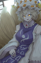 Rule 34 | 1girl, absurdres, animal ears, blonde hair, blue tabard, breasts, dress, fox ears, fox tail, glowing, glowing eyes, hat, highres, large breasts, long sleeves, looking at viewer, mob cap, multiple tails, ofuda, ofuda on clothes, solo, tabard, tail, touhou, white dress, white hat, wide sleeves, yakumo ran, yama kabosu, yellow eyes