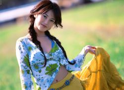 Rule 34 | 1girl, asian, blurry, bra strap, braid, breasts, brown hair, clothes lift, depth of field, dutch angle, happy, hasebe yu, highres, long hair, looking at viewer, outdoors, photo (medium), skirt, skirt lift, small breasts, smile, solo, tagme, twin braids