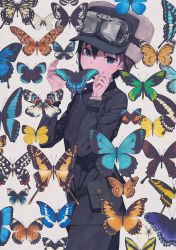 Rule 34 | 1girl, androgynous, bag, belt, belt pouch, black belt, black hair, black jacket, black pants, blue butterfly, blue eyes, bug, butterfly, cover image, covered mouth, cowboy shot, expressionless, fur hat, goggles, goggles on headwear, grey background, hands up, hat, highres, insect, jacket, kino (kino no tabi), kino no tabi, kuroboshi kouhaku, long sleeves, looking at viewer, novel illustration, official art, pants, pouch, reverse trap, second-party source, short hair, simple background, solo, standing, textless version, tomboy