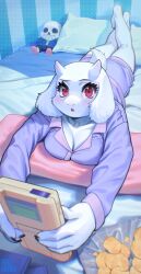 Rule 34 | 1girl, animal ears, bed, blush, breasts, character doll, chips (food), cleavage, fingernails, food, furry, furry female, goat ears, goat girl, goat horns, goat tail, handheld game console, highres, horns, inuki (aruurara), large breasts, looking at viewer, lying, medium breasts, on stomach, open mouth, pajamas, pillow, potato chips, purple pajamas, red eyes, sans (undertale), sharp fingernails, shorts, solo, toriel, undertale