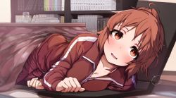 Rule 34 | 1girl, abe nana, blush, book, breasts, brown eyes, brown hair, cleavage, commentary request, highres, idolmaster, idolmaster cinderella girls, jacket, long sleeves, looking at viewer, lying, on side, open mouth, ponytail, red jacket, short hair, smile, solo, table, woshinon