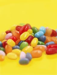 Rule 34 | blurry, candy, commentary request, depth of field, food, food focus, jelly bean, kya4, no humans, original, photorealistic, realistic, still life, yellow background