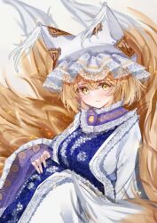 Rule 34 | 1girl, animal ears, blonde hair, blush, breasts, closed mouth, dress, fox ears, fox tail, hair between eyes, hat, highres, large breasts, long sleeves, mob cap, multiple tails, sarasadou dan, short hair, simple background, solo, tabard, tail, touhou, white background, white dress, white headwear, wide sleeves, yakumo ran, yellow eyes