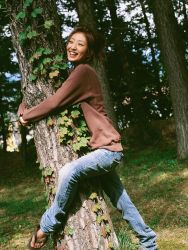 Rule 34 | 1girl, against tree, ando sayaka, asian, brown hair, dendrophilia, denim, dutch angle, dyed hair, forest, grass, high ponytail, ivy, jeans, outdoors, pants, photo (medium), ponytail, sandals, short hair, smile, solo, sweater, sweater, tree, tree hug