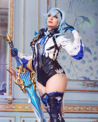 Rule 34 | 1girl, blue hair, breasts, cosplay, eula (genshin impact), eula (genshin impact) (cosplay), genshin impact, gloves, grey eyes, highres, holding, holding weapon, large breasts, lips, necktie, peyton cosplay, photo (medium), real life, tattoo, tattoo on thigh, thighs, weapon