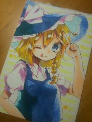Rule 34 | 1girl, ;p, blonde hair, blue eyes, blush, braid, collared shirt, hat, highres, kirisame marisa, looking at viewer, medium request, niri, one eye closed, photo (medium), puffy short sleeves, puffy sleeves, shirt, short hair, short sleeves, side braid, single braid, solo, tongue, tongue out, touhou, traditional media, v, vest, witch hat