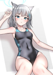 Rule 34 | 1girl, animal ear fluff, animal ears, black one-piece swimsuit, blue archive, blue eyes, breasts, commentary request, competition swimsuit, covered navel, cowboy shot, cross hair ornament, extra ears, grey hair, h kasei, hair ornament, halo, highres, low ponytail, lying, medium breasts, medium hair, mismatched pupils, multicolored clothes, multicolored swimsuit, official alternate costume, one-piece swimsuit, partial commentary, shiroko (blue archive), shiroko (swimsuit) (blue archive), solo, swimsuit, wolf ears