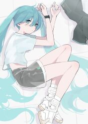 Rule 34 | 1girl, absurdres, aqua eyes, aqua hair, aqua nails, black shorts, closed mouth, commentary, curled up, detached sleeves removed, expressionless, full body, hatsune miku, highres, long hair, looking at viewer, lying, myomuron, on side, shirt, short sleeves, shorts, socks, solo, t-shirt, twintails, very long hair, vocaloid, watch, white footwear, white socks, wristwatch