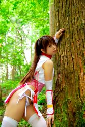 Rule 34 | 1girl, actress request, against tree, asian, cosplay, dead or alive, forest, japanese clothes, kasumi (doa), kasumi (doa) (cosplay), long hair, looking at viewer, nature, outdoors, panties, pelvic curtain, photo (medium), ponytail, side-tie panties, skindentation, solo, source request, sword, tecmo, thighhighs, tree, underwear, wakizashi, weapon, white panties, white thighhighs