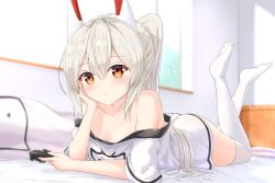 Rule 34 | 1girl, absurdres, ayanami (azur lane), ayanami (niconico) (azur lane), azur lane, bare shoulders, blonde hair, blush, breasts, controller, game controller, hair between eyes, headgear, highres, long hair, looking at viewer, lying, on stomach, orange eyes, ponytail, shirt, sidelocks, sironora, small breasts, solo, thighhighs, white thighhighs