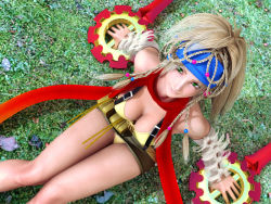Rule 34 | 00s, 1girl, 3d, blonde hair, braid, breasts, cleavage, female focus, final fantasy, final fantasy x, final fantasy x-2, from above, grass, green eyes, incise soul, legs, long hair, m-rs, plant, rikku (ff10), scarf, sitting, skirt, solo, weapon