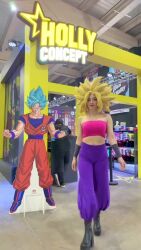 1girl animated ass ass_focus audible_music black_hair blonde_hair breasts caulifla caulifla_(cosplay) cosplay dragon_ball dragon_ball_super large_breasts muscular muscular_female presenting real_life sexually_suggestive sound super_saiyan tagme video