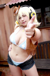 Rule 34 | 1girl, asian, blonde hair, boots, breasts, brown eyes, chouzuki maryou, cosplay, cowboy boots, cowboy hat, hat, headphones, highres, jewelry, large breasts, necklace, nitroplus, photo (medium), plump, solo, star (symbol), super pochaco, super pochaco (cosplay)