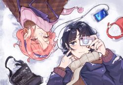 2girls black_bag black_hair blue_coat brown_coat brown_scarf camera cellphone coat commentary ear_piercing earbuds earphones earrings hairband highres holding holding_camera hoop_earrings jewelry kininatteru_hito_ga_otoko_ja_nakatta koga_mitsuki long_hair lying mitsuayacanon mole mole_under_eye multiple_girls on_back on_ground oosawa_aya phone piercing pink_eyes pink_hair pink_scarf purple_hairband red_bag ring scarf shared_earphones smartphone smile snow symbol-only_commentary twitter_username