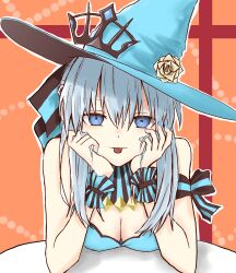 Rule 34 | 1girl, absurdres, bare shoulders, blue eyes, blue hat, blue nails, breasts, cleavage, fate/grand order, fate (series), hat, head on hand, head rest, highres, long hair, looking at viewer, medium breasts, morgan le fay (fate), morgan le fay (valentine witches) (fate), motoi shin, nail polish, orange background, solo, table, tongue, tongue out, white hair, witch hat, wrist cuffs