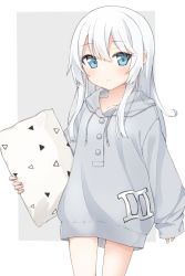 Rule 34 | 1girl, alternate costume, blue eyes, blush, buttons, collarbone, cowboy shot, grey hoodie, hair between eyes, hibiki (kancolle), highres, holding, holding pillow, hood, hoodie, kantai collection, long hair, long sleeves, parted lips, pillow, rateratte, silver hair, solo