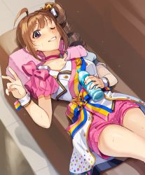 Rule 34 | 1girl, ahoge, bottle, brown hair, butterfly hair ornament, butterfly ornament, choker, commentary, couch, drill hair, grin, hair ornament, hair ribbon, holding, holding bottle, idol, idolmaster, idolmaster million live!, jacket, kamille (vcx68), looking at viewer, lying, medium hair, nouvelle tricolore (idolmaster), on back, on couch, one eye closed, pillow, pink choker, pink shorts, polka dot, polka dot shorts, purple eyes, ribbon, sash, short shorts, short sleeves, shorts, side drill, sidelocks, smile, solo, sweat, v, water bottle, white jacket, white ribbon, wrist cuffs, yokoyama nao