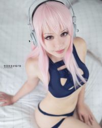 Rule 34 | 1girl, breasts, cosplay, headphones, koneeko, photo (medium), pink hair, solo, super sonico
