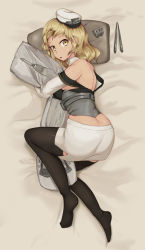 Rule 34 | 1girl, bed, black thighhighs, blonde hair, breasts, commentary, dakimakura (object), english commentary, full body, hat, headgear, highres, houston (kancolle), hugging object, jakkit01828, kantai collection, large breasts, long hair, looking at viewer, peaked cap, pillow, pillow hug, rocket, short hair, skirt, solo, thighhighs, white hat, white skirt, yellow eyes