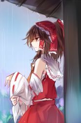 Rule 34 | 1girl, ascot, bare shoulders, bow, brown eyes, brown hair, detached sleeves, from side, frown, hair bow, hair tubes, hakurei reimu, japanese clothes, kutsuki kai, miko, ponytail, rain, red bow, red skirt, ribbon-trimmed sleeves, ribbon trim, skirt, skirt set, solo, touhou, wide sleeves, wringing clothes