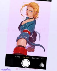 Rule 34 | 1girl, ass, blonde hair, blue eyes, breasts, cammy white, cleavage, from above, highres, jacket, large breasts, lips, long sleeves, pants, selfie, shoes, short hair, street fighter, street fighter 6, valentina tavolilla