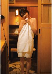 Rule 34 | 1girl, aida rikako, highres, indoors, looking at viewer, photo (medium), smile, standing, towel, voice actor