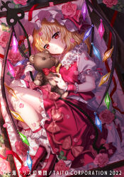 Rule 34 | 1girl, ascot, blonde hair, blush, bobby socks, bow, button eyes, buttons, coffin, collared shirt, commentary request, copyright notice, crystal, flandre scarlet, flower, frilled shirt collar, frills, full body, hat, hat ribbon, highres, holding, holding stuffed toy, kiba tori, laevatein (touhou), leaf, looking at viewer, lying, mary janes, medium hair, mob cap, on side, parted lips, petals, red bow, red eyes, red flower, red footwear, red ribbon, red rose, red skirt, red vest, ribbon, rose, rose petals, shirt, shoes, skirt, skirt set, slit pupils, socks, solo, stuffed animal, stuffed toy, teddy bear, touhou, vest, white hat, white shirt, white socks, wings, wrist cuffs, yellow ascot
