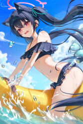 1girl absurdres animal_ears banana_boat bikini black_hair blue_archive blue_sky cat_ears cat_girl chiya_(inae129) cloud cloudy_sky commentary_request day fang frilled_bikini frills from_side highres long_hair looking_at_viewer navel ocean off-shoulder_bikini off_shoulder official_alternate_costume open_mouth outdoors red_eyes serika_(blue_archive) serika_(swimsuit)_(blue_archive) sky solo swimsuit twintails very_long_hair water water_drop