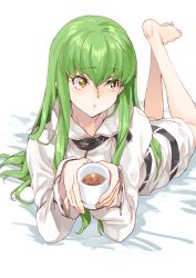 Rule 34 | 1girl, barefoot, c.c., code geass, creayus, cup, green hair, holding, holding cup, hood, hoodie, legs up, long hair, looking away, lying, on stomach, parted lips, solo, straitjacket, the pose, yellow eyes