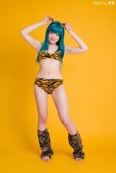 Rule 34 | 1girl, animal print, aqua hair, armpits, artist request, asian, bikini, blue hair, breasts, color contacts, contrapposto, cosplay, fake horns, highres, horns, indoors, leg warmers, long hair, looking at viewer, lum, lum (cosplay), namada, parted lips, photo (medium), purple eyes, simple background, small breasts, smile, solo, standing, strapless, strapless bikini, swimsuit, tiger print, urusei yatsura, yellow background