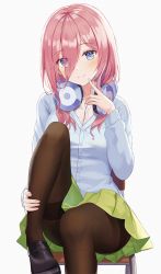 Rule 34 | 1girl, black footwear, blue eyes, blue shirt, blush, breasts, brown pantyhose, closed mouth, commentary request, eyes visible through hair, feet out of frame, finger to mouth, go-toubun no hanayome, green skirt, hair between eyes, headphones, headphones around neck, highres, hyonee, leg hold, long hair, long sleeves, nakano miku, pantyhose, pink hair, pleated skirt, shirt, simple background, sitting, skirt, small breasts, smile, solo, thighband pantyhose, white background, white shirt
