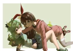 Rule 34 | all fours, alternate costume, amber (genshin impact), arms behind back, breasts, brown eyes, brown gloves, brown hair, closed mouth, collei (genshin impact), elbow gloves, flat chest, food, food in mouth, genshin impact, gloves, green background, green hair, green shirt, green shorts, hair ornament, hood, hood down, hoodie, leaning back, long hair, long sleeves, looking to the side, medium breasts, pocky, pocky in mouth, pocky kiss, purple eyes, red hoodie, shared food, shirt, short sleeves, shorts, simple background, sitting, wu du, yuri