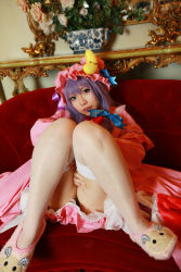 Rule 34 | 1girl, asian, cosplay, couch, crescent, dress, female focus, hat, highres, long hair, patchouli knowledge, photo (medium), purple hair, red upholstery, slippers, solo, tenshi myu, thighhighs, touhou