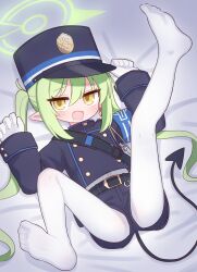 Rule 34 | 1girl, :d, arm up, armband, bed sheet, belt, belt buckle, black belt, black hat, black jacket, black shorts, blue archive, blush, buckle, commentary, demon tail, fang, gloves, green hair, hair between eyes, halo, hand up, hat, nozomi (blue archive), highres, jacket, leg up, long hair, long sleeves, looking at viewer, lying, naga u, on back, open mouth, pantyhose, pantyhose under shorts, peaked cap, pointy ears, shirt, short shorts, shorts, sleeves past wrists, smile, solo, symbol-only commentary, tail, twintails, very long hair, white gloves, white pantyhose, white shirt, yellow eyes