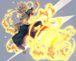 Rule 34 | 1boy, ball, blonde hair, clenched hand, fire, gouenji shuuya, inazuma eleven, inazuma eleven (series), katsutake, male focus, shorts, soccer uniform, solo, spiked hair, sportswear