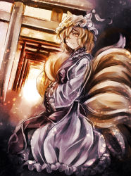 Rule 34 | 1girl, animal hat, bad id, bad pixiv id, blonde hair, dress, fox tail, hands in opposite sleeves, hat, highres, jan (lightdragoon), long sleeves, looking at viewer, mob cap, multiple tails, mob cap, solo, table, tail, torii, touhou, white dress, wide sleeves, yakumo ran, yellow eyes