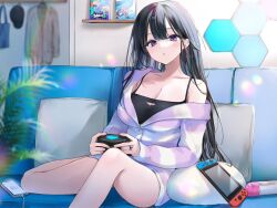 Rule 34 | 1girl, :o, bare shoulders, black hair, blue camisole, blush, breasts, camisole, cleavage, collarbone, controller, couch, holding, holding controller, indoors, jacket, large breasts, long hair, long sleeves, looking at viewer, nekoyashiki pushio, nintendo switch, off shoulder, original, parted lips, pillow, plant, purple eyes, short shorts, shorts, sitting, solo, spaghetti strap, white jacket