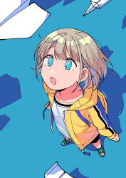 Rule 34 | 1girl, absurdres, bike shorts, blue background, blue eyes, breasts, collarbone, dot nose, from above, full body, grey hair, highres, hood, hoodie, idolmaster, idolmaster shiny colors, long sleeves, looking at another, looking up, medium breasts, niyororinpayamaru, open clothes, open hoodie, open mouth, paper airplane, serizawa asahi, shadow, shirt, shoes, short hair, sneakers, solo, white shirt, yellow hoodie