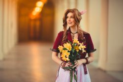 Rule 34 | 1girl, aerith gainsborough, aerith gainsborough (cosplay), breasts, briana white, brown hair, cosplay, final fantasy, final fantasy vii, final fantasy vii remake, green eyes, highres, photo (medium), smile, square enix, voice actor connection